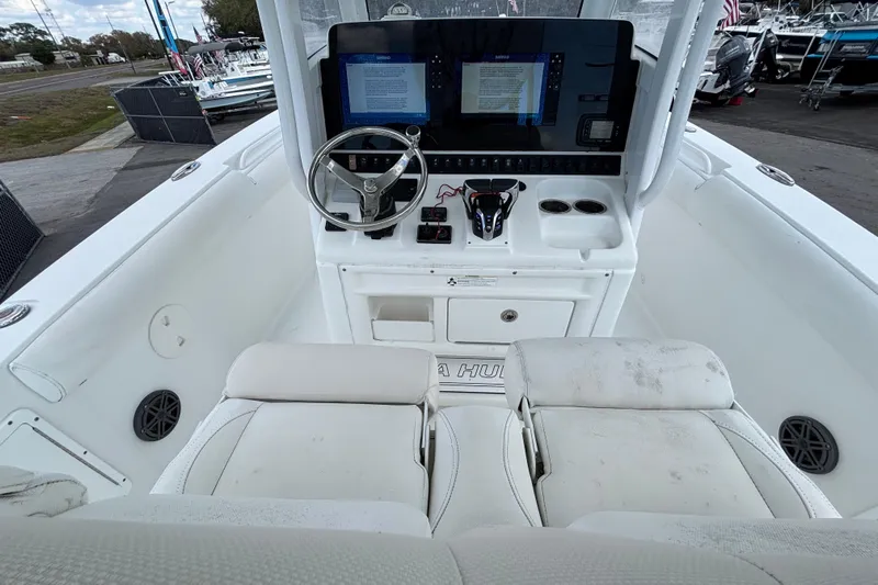  Yacht Photos Pics 2018 Sea Hunt Gamefish 30 boat cockpit with steering wheel and dual displays.