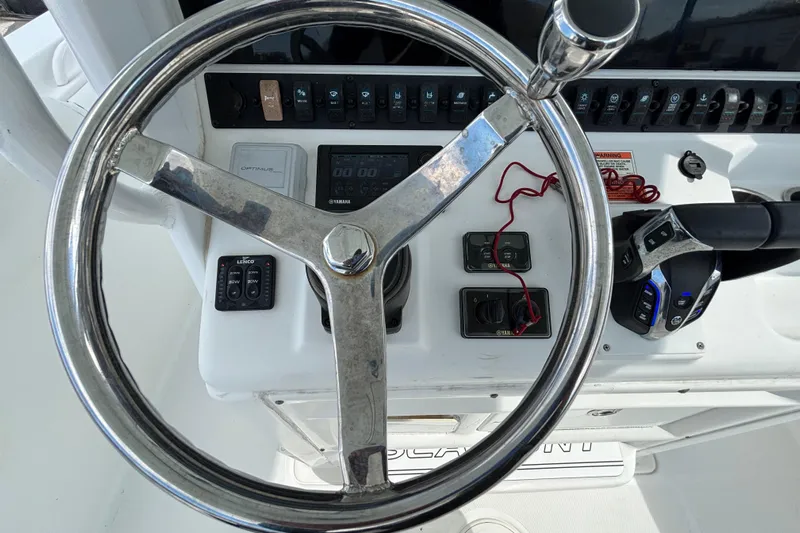  Yacht Photos Pics Steering wheel and controls of 2018 Sea Hunt Gamefish 30 boat cockpit.