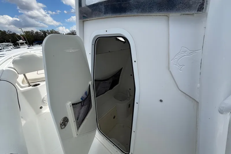  Yacht Photos Pics 2018 Sea Hunt Gamefish 30 Forward Seating boat interior with open storage compartment.