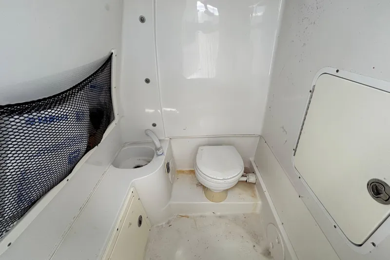  Yacht Photos Pics 2018 Sea Hunt Gamefish 30 boat interior with toilet and sink.