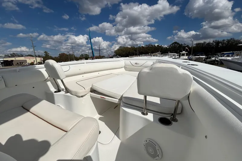  Yacht Photos Pics 2018 Sea Hunt Gamefish 30 Forward Seating boat under a partly cloudy sky.