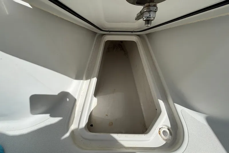  Yacht Photos Pics 2018 Sea Hunt Gamefish 30 Forward Seating storage compartment, open and empty.