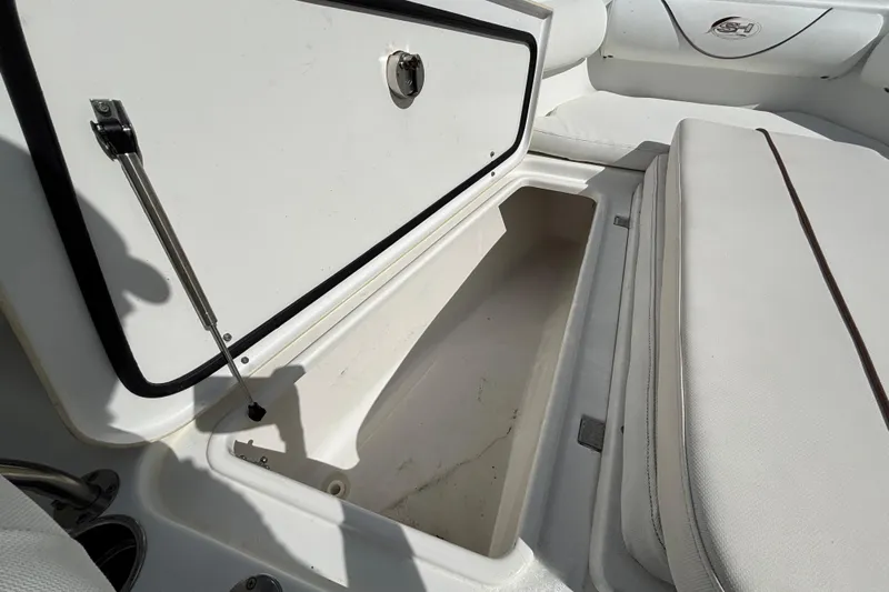  Yacht Photos Pics 2018 Sea Hunt Gamefish 30 Forward Seating storage compartment open, showcasing interior space.