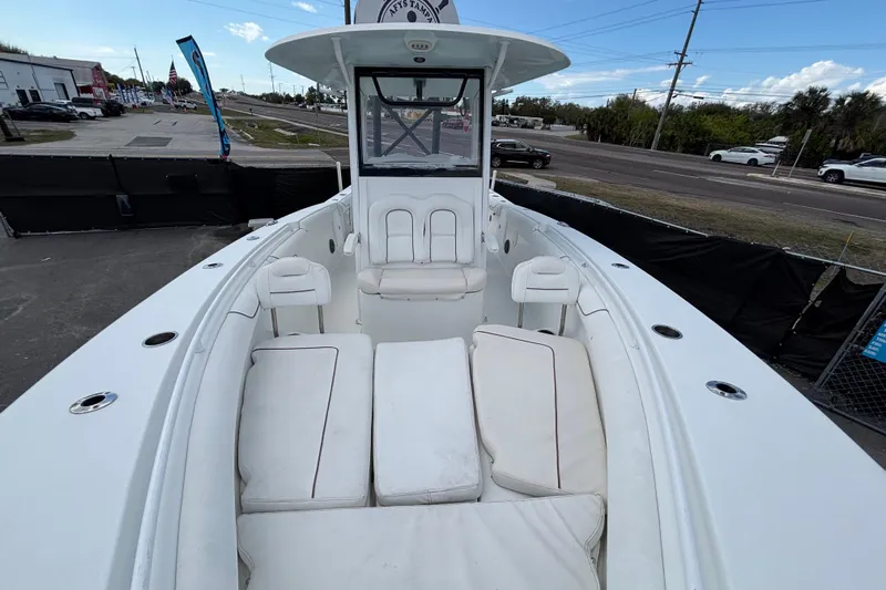  Yacht Photos Pics 2018 Sea Hunt Gamefish 30 boat with forward seating, parked on a lot.