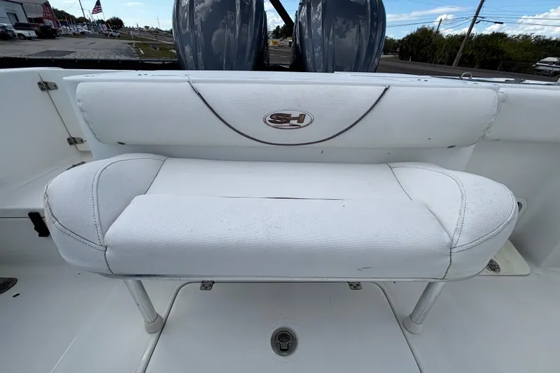  Yacht Photos Pics 2018 Sea Hunt Gamefish 30 Forward Seating, white cushioned bench, outdoor setting.