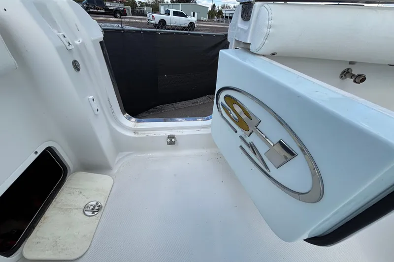  Yacht Photos Pics 2018 Sea Hunt Gamefish 30 boat interior with logo and seating area.