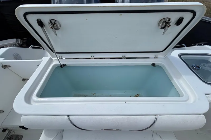  Yacht Photos Pics Open storage compartment on 2018 Sea Hunt Gamefish 30 Forward Seating boat.