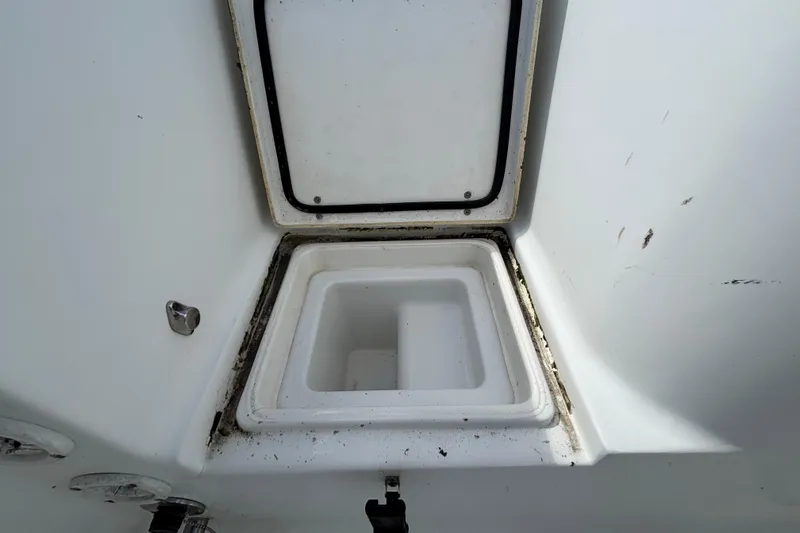  Yacht Photos Pics Open storage compartment on 2018 Sea Hunt Gamefish 30 Forward Seating boat.
