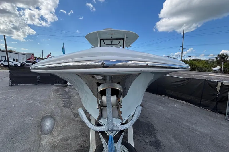  Yacht Photos Pics 2018 Sea Hunt Gamefish 30 boat on trailer under blue sky.