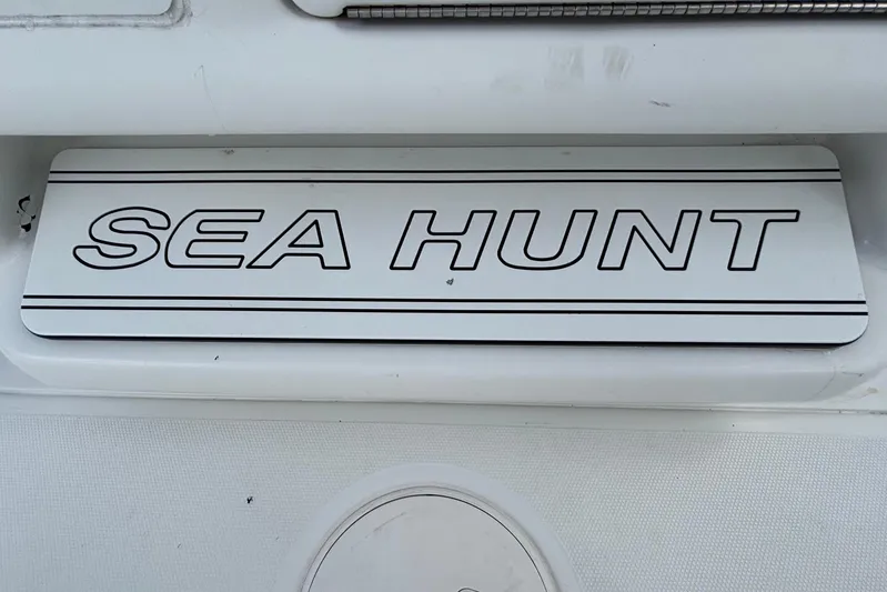  Yacht Photos Pics 2018 Sea Hunt Gamefish 30 Forward Seating boat logo on white surface.