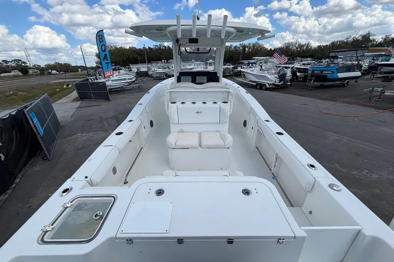 Yacht Photos Pics 2018 Sea Hunt Gamefish 30 Forward Seating boat at dealership, clear sky, for sale.