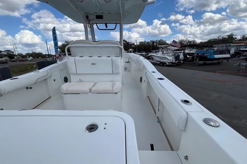  Yacht Photos Pics 2018 Sea Hunt Gamefish 30 boat with forward seating, displayed outdoors under a cloudy sky.