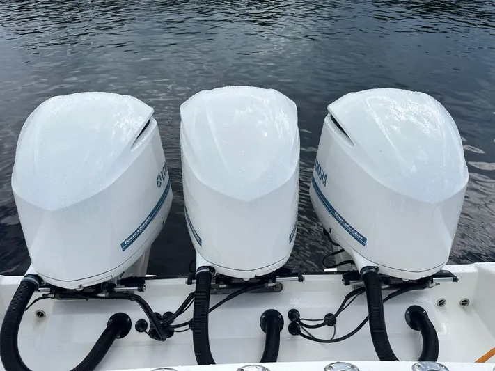 Perfection Yacht Photos Pics Triple outboard engines on a 2020 Edgewater 370 CC boat.