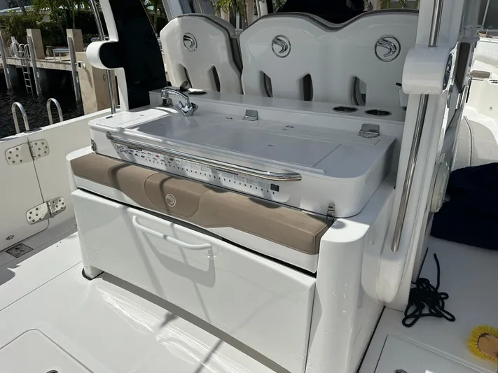 Perfection Yacht Photos Pics 2020 Edgewater 370 CC boat interior with seating and sink area.