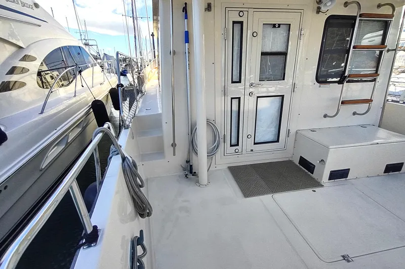 Green Goose Yacht Photos Pics Nordic Tug 42, 1998 model, docked with clean deck and secure railing.