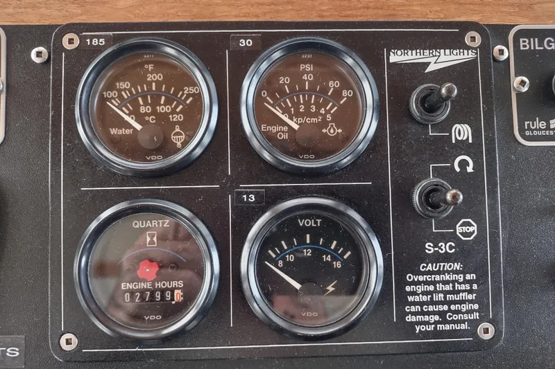 Green Goose Yacht Photos Pics Control panel of a 1998 Nordic Tug 42 with gauges and switches.