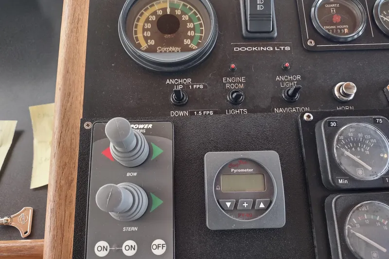 Green Goose Yacht Photos Pics Control panel of a 1998 Nordic Tug 42 with gauges and switches.