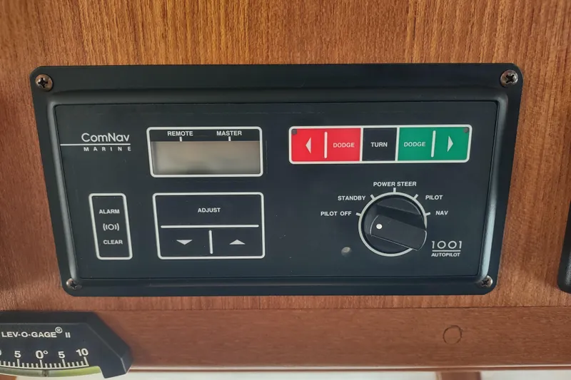 Green Goose Yacht Photos Pics Control panel of a 1998 Nordic Tug 42 with ComNav Marine autopilot system.