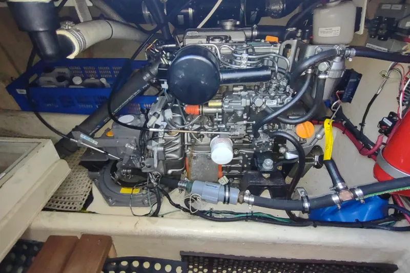 Green Goose Yacht Photos Pics Engine compartment of a 1998 Nordic Tug 42, showcasing detailed mechanical components.