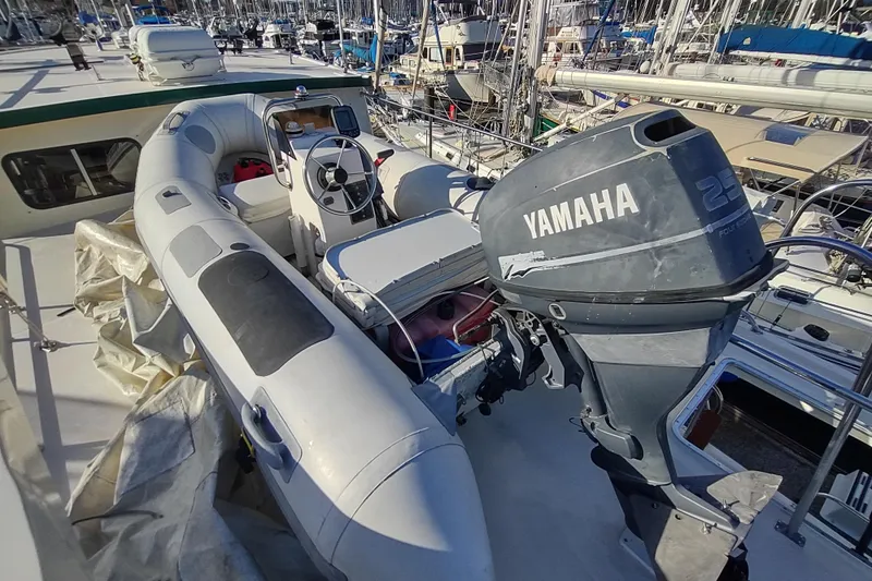 Green Goose Yacht Photos Pics Inflatable boat with Yamaha outboard motor on 1998 Nordic Tug 42 deck.
