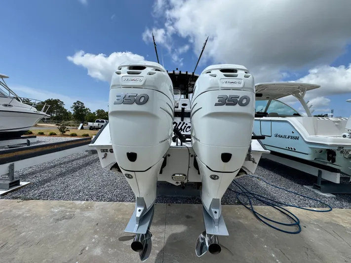  Yacht Photos Pics 2022 Cape Horn 32 T boat with twin 350 horsepower engines, docked outdoors.