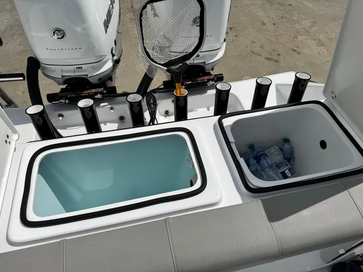  Yacht Photos Pics 2022 Cape Horn 32 T boat with dual outboard motors, rod holders, and storage compartments.