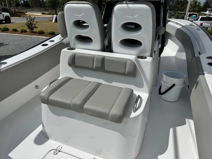  Yacht Photos Pics 2022 Cape Horn 32 T boat interior with cushioned seating and modern design.