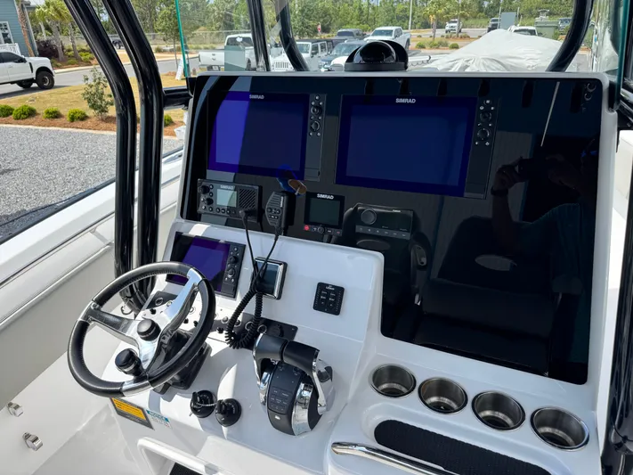  Yacht Photos Pics 2022 Cape Horn 32 T boat dashboard with navigation screens and controls.