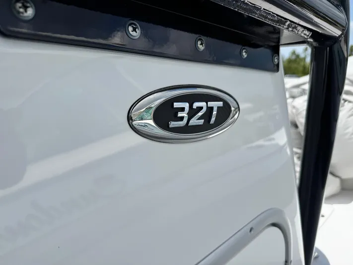  Yacht Photos Pics Cape Horn 32 T 2022 boat emblem on white surface.