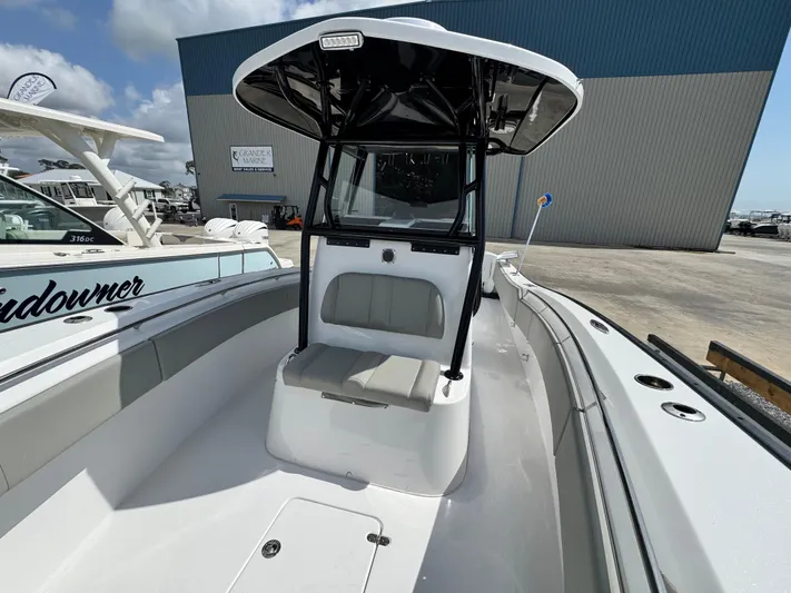  Yacht Photos Pics 2022 Cape Horn 32 T boat with T-top and seating, docked outdoors.