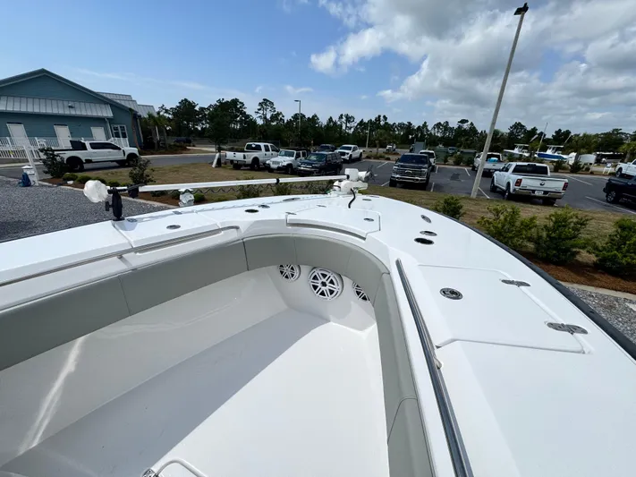  Yacht Photos Pics 2022 Cape Horn 32 T boat, spacious deck, parked outdoors under cloudy sky.