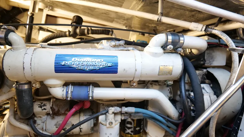 Extremely Clean Boat Yacht Photos Pics Engine compartment of a 2000 Tiara Yachts 3700 Open, featuring Diamond Performance Series components.