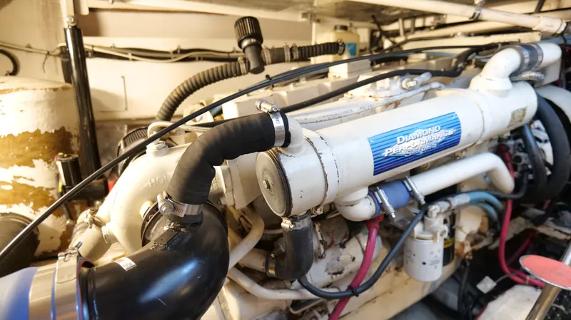 Extremely Clean Boat Yacht Photos Pics Engine room of a 2000 Tiara Yachts 3700 Open, featuring a Diamond Performance engine.