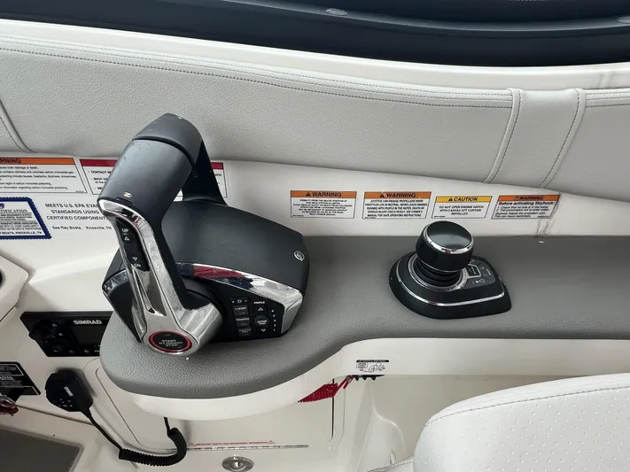  Yacht Photos Pics Control panel of 2023 Sea Ray Sundancer 320 boat with throttle and joystick.