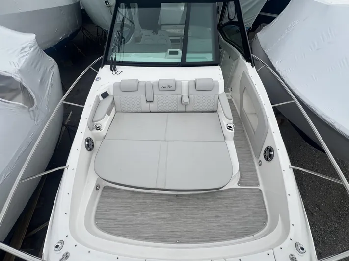  Yacht Photos Pics 2023 Sea Ray Sundancer 320 boat with spacious seating and sleek design.