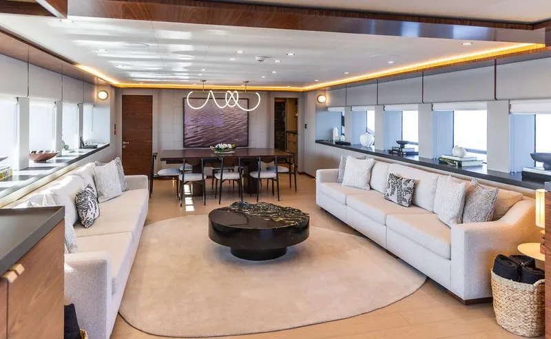Infinity Nine Yacht Photos Pics Luxurious interior of 2022 AvA Yachts Kando, featuring elegant seating and modern decor.