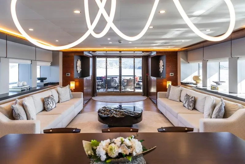 Infinity Nine Yacht Photos Pics Luxurious interior of 2022 AvA Yachts Kando, featuring elegant seating and modern lighting.