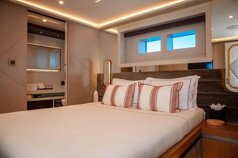Infinity Nine Yacht Photos Pics Luxurious bedroom interior on 2022 AvA Yachts Kando, featuring elegant design and modern amenities.