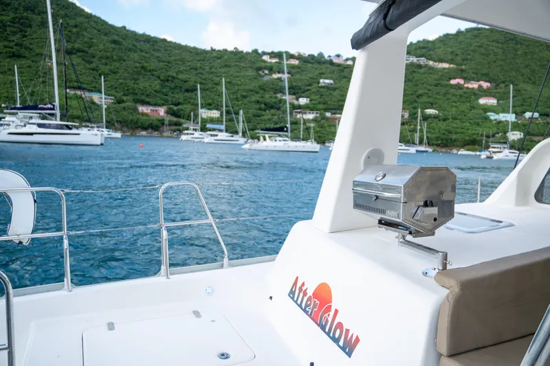  Yacht Photos Pics Voyage Yachts VOYAGE 480, 2017 model, docked with scenic bay and hills in background.