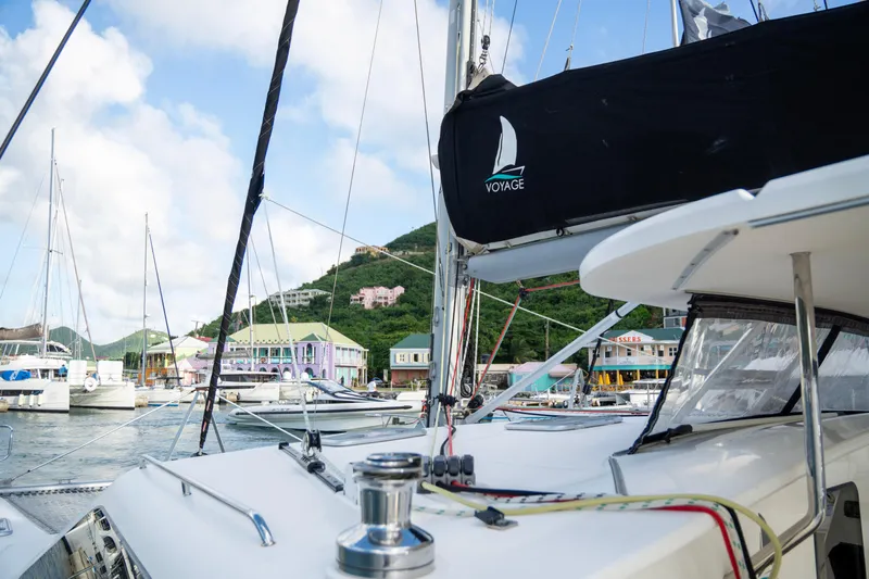  Yacht Photos Pics 2017 Voyage Yachts VOYAGE 480 sailboat docked in scenic marina.