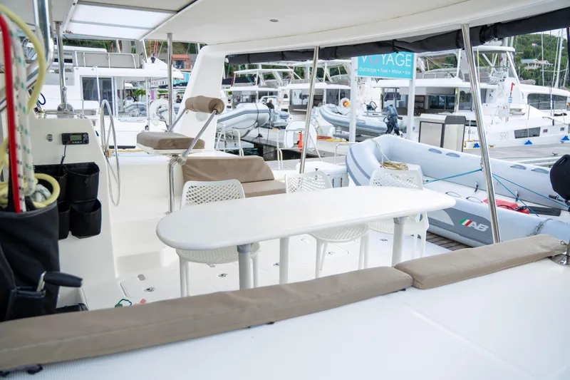  Yacht Photos Pics Spacious deck of 2017 Voyage Yachts VOYAGE 480 with seating and table.