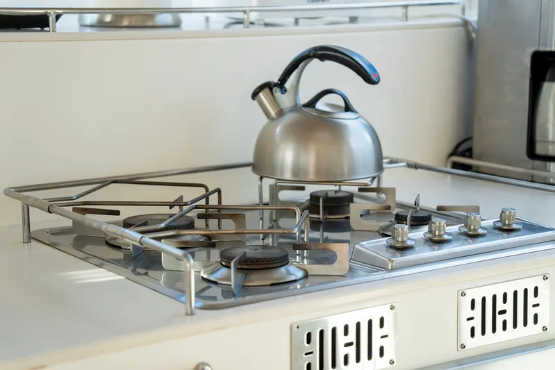  Yacht Photos Pics Stainless steel stove with kettle on Voyage Yachts VOYAGE 480, 2017 model.