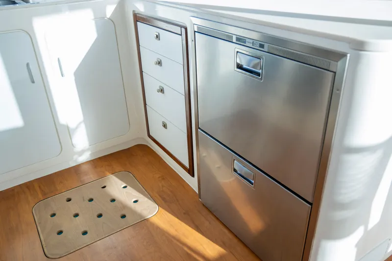  Yacht Photos Pics Modern kitchen area in 2017 Voyage Yachts VOYAGE 480 with stainless steel appliances.