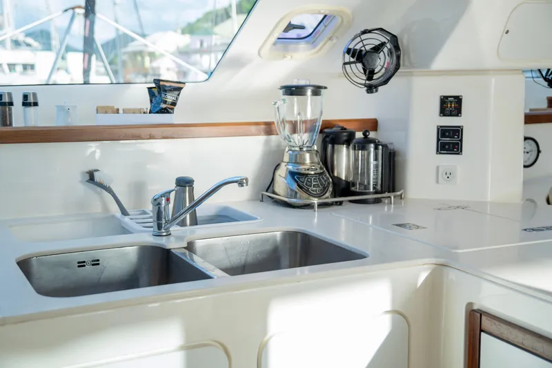  Yacht Photos Pics Modern kitchen in 2017 Voyage Yachts VOYAGE 480 with sink, blender, and appliances.