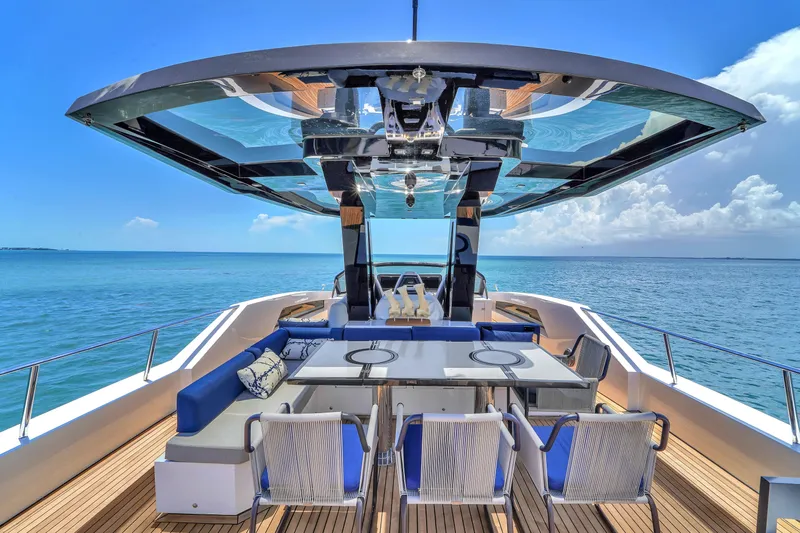  Yacht Photos Pics Luxury OKEAN 80 yacht deck with seating, ocean view, and modern design, 2021 model.