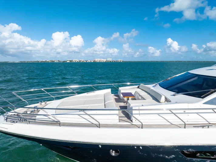 Mancusa Yacht Photos Pics Azimut Fly 72 yacht cruising on blue ocean under clear sky, 2016 model.