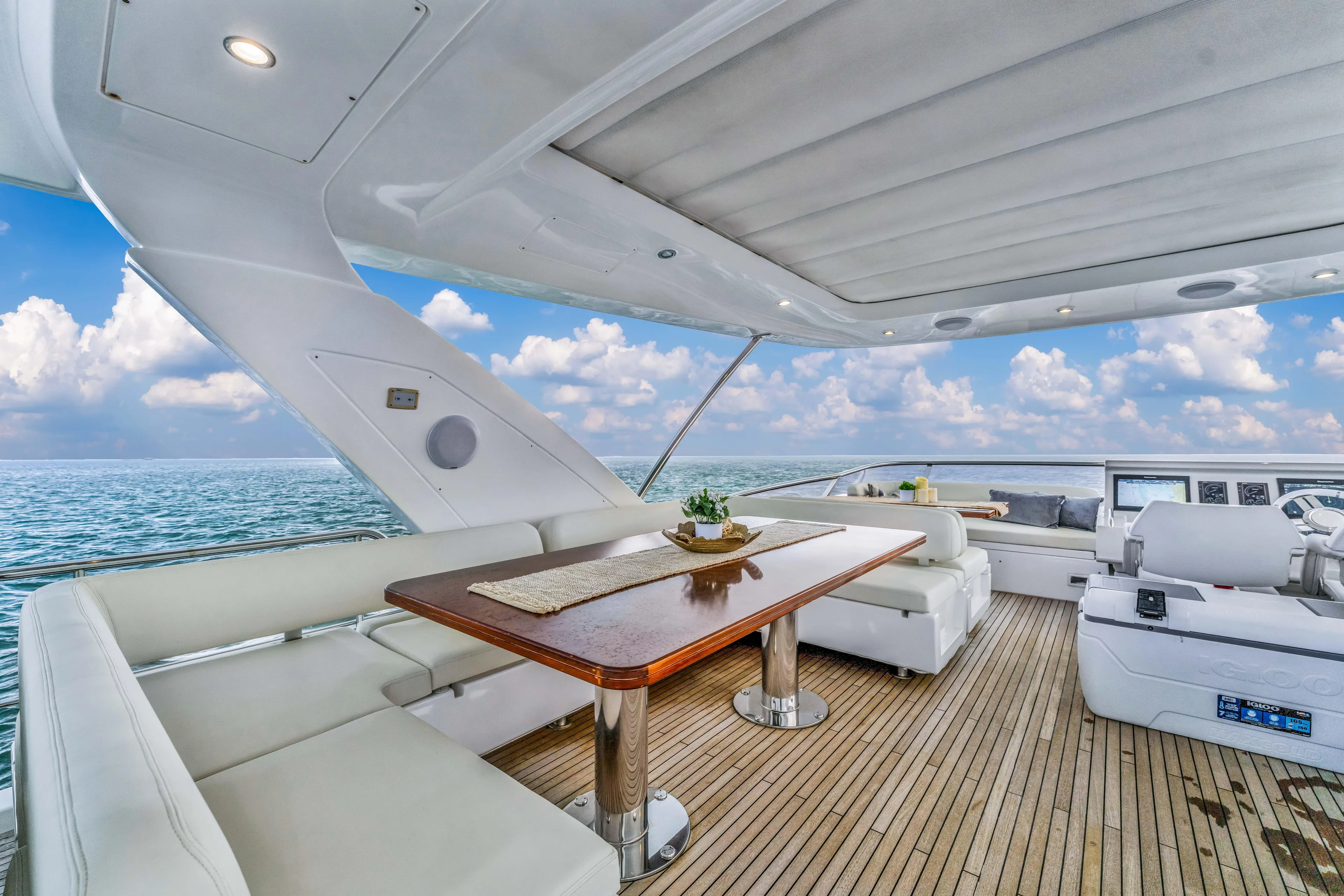 Mancusa Yacht Photos Pics Luxurious 2016 Azimut Fly 72 yacht interior with elegant seating and ocean view.