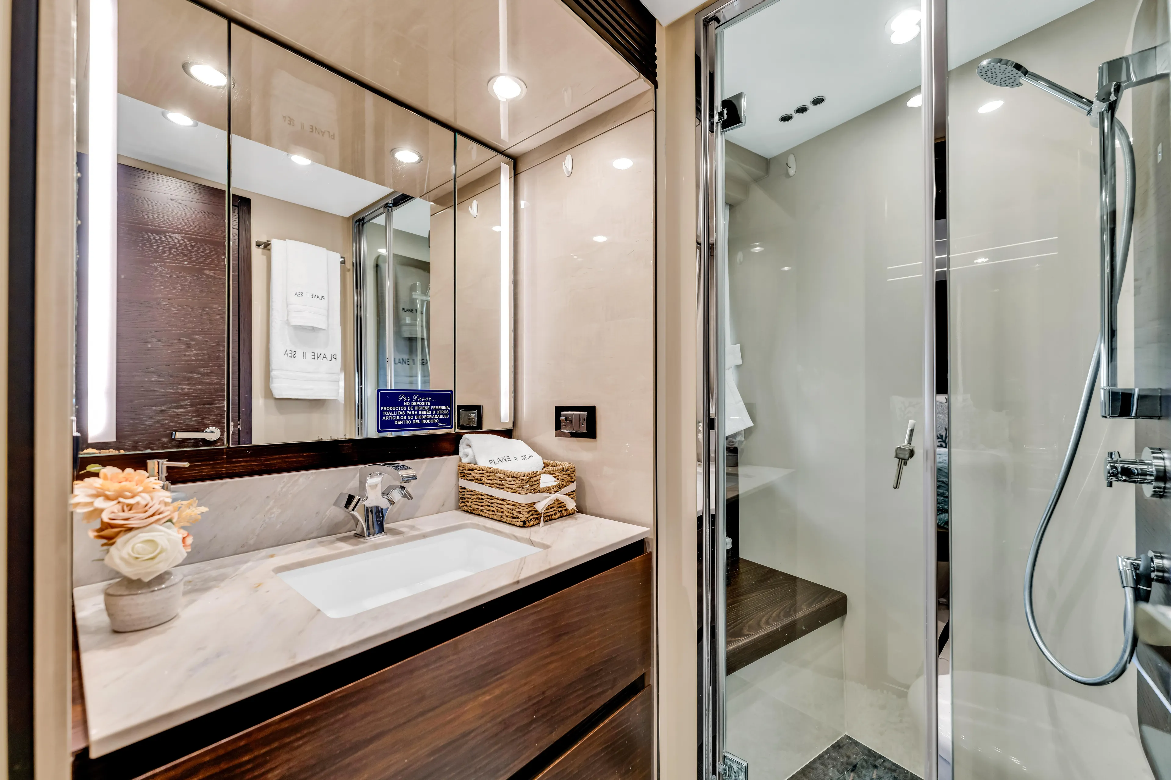 Mancusa Yacht Photos Pics Luxurious bathroom in 2016 Azimut Fly 72 yacht with modern fixtures and elegant design.