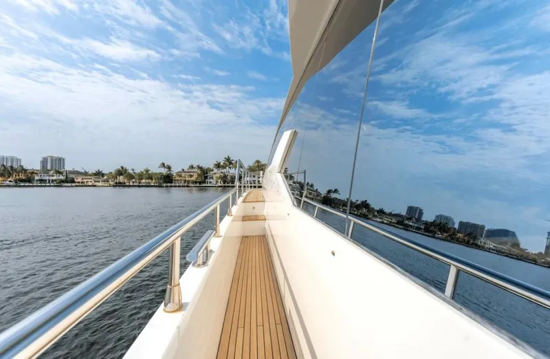 Mancusa Yacht Photos Pics Azimut Fly 72 yacht deck, 2016 model, reflecting water and skyline.