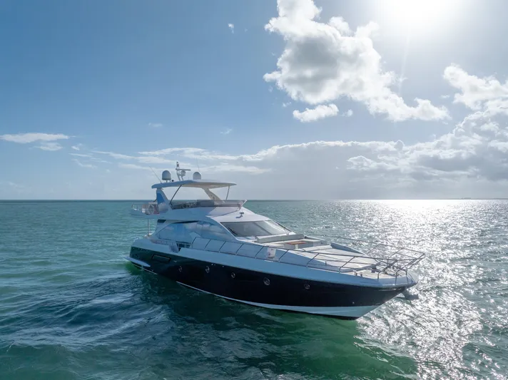 Mancusa Yacht Photos Pics Azimut Fly 72 yacht, 2016 model, cruising on a sunny ocean.